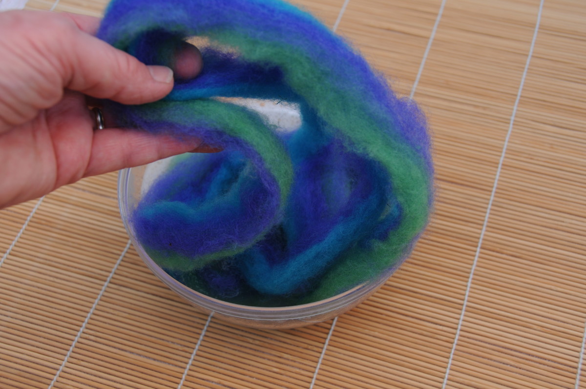 With the two pieces aligned put into the hot soapy water and leave for a minute or soak through.