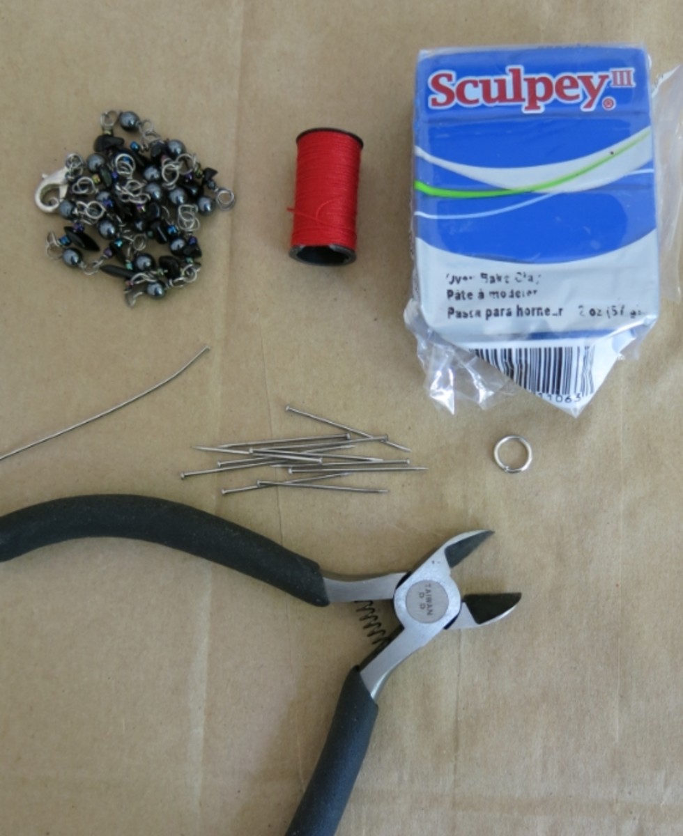 Materials to make a "string art" pendant or brooch