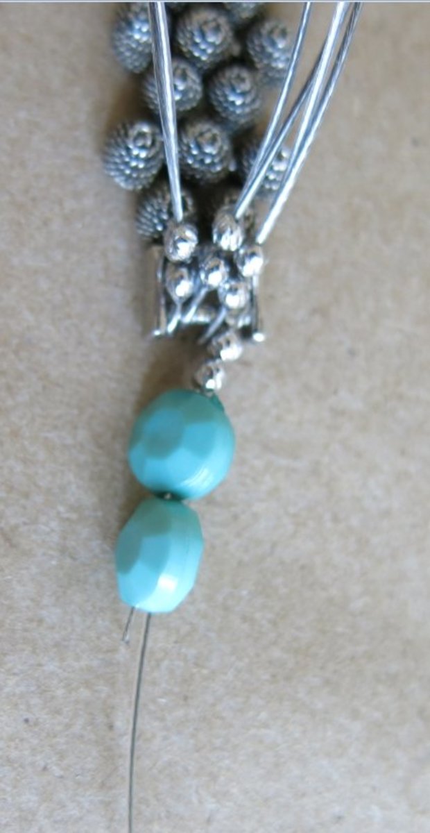 Begin adding beads to your necklace.