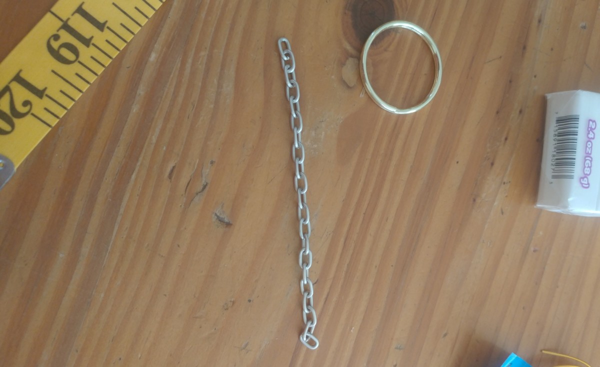 Small jewelry chain is ideal to cut for a keychain. It may be as long as you wish.