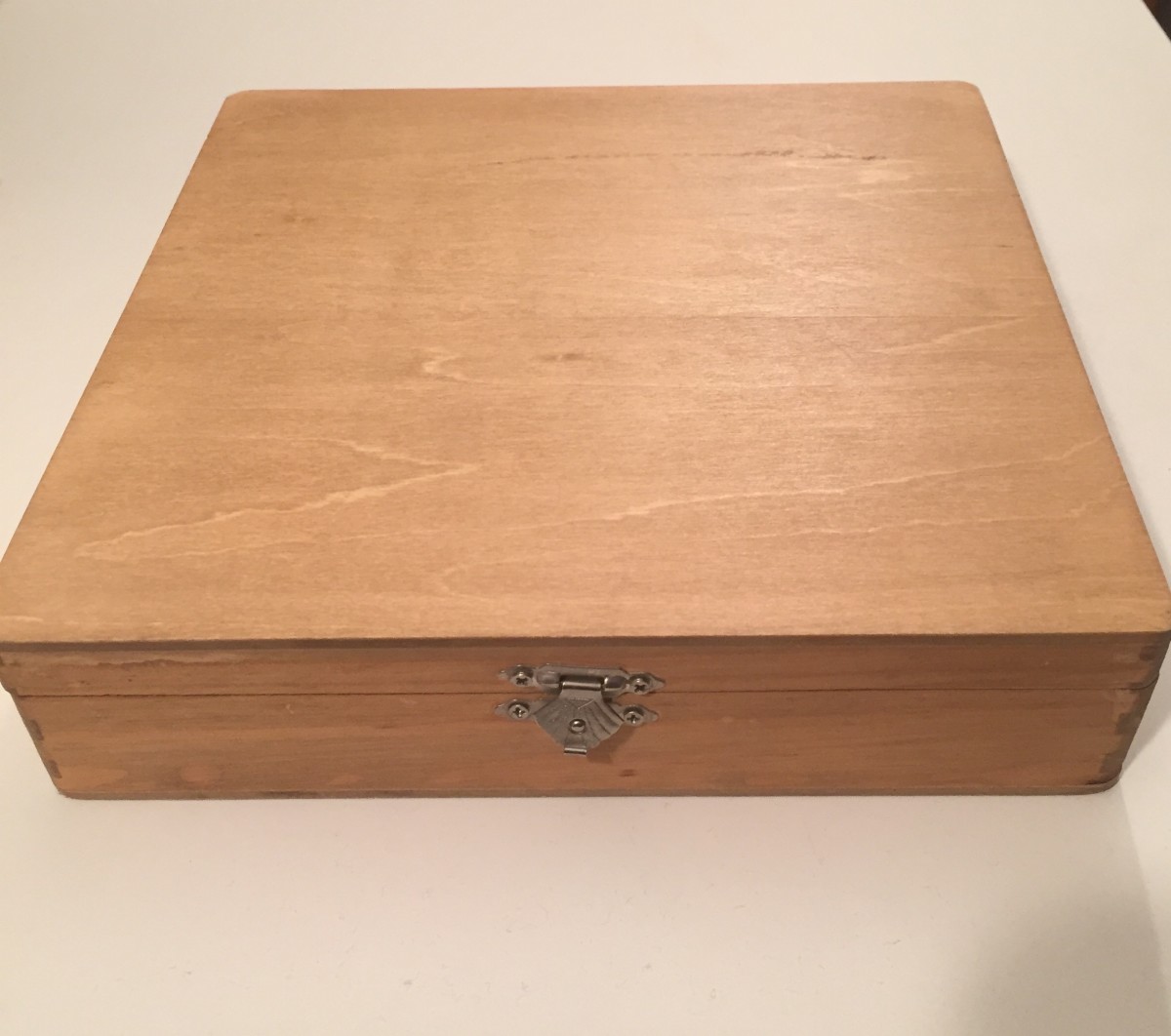 My 8" by 8" wooden box with a hinge.