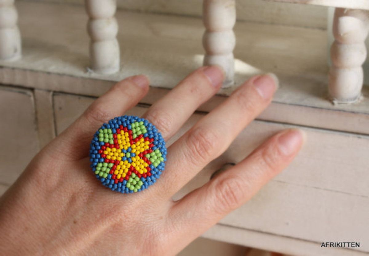 A brightly colored beaded flower ring is a piece of statement jewelry.