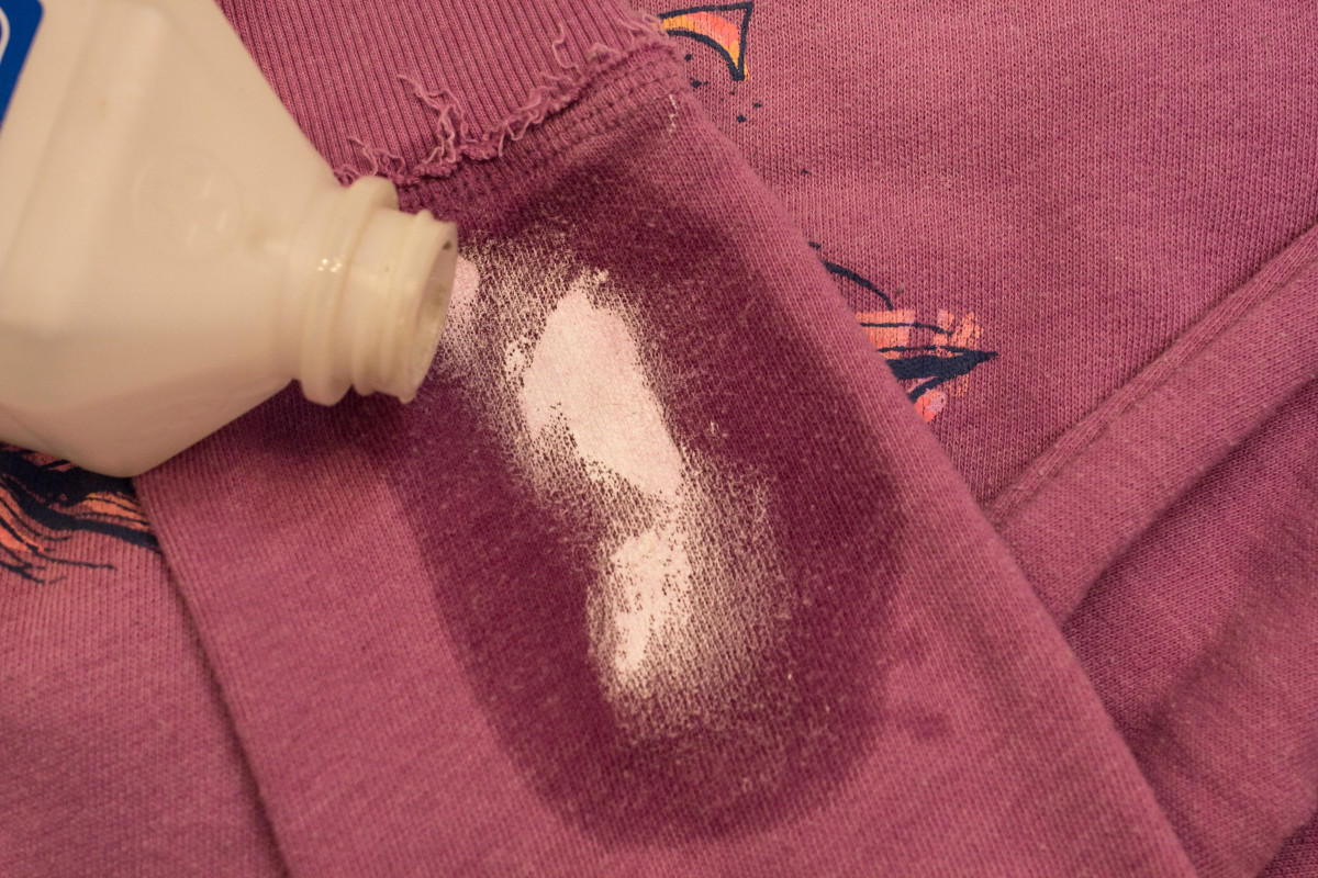 Pour the rubbing alcohol on the stain.