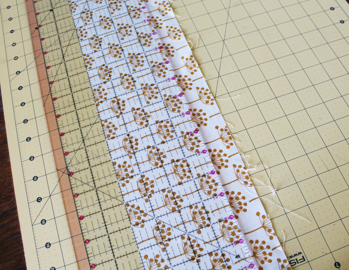 Cut a four-inch strip of fabric.