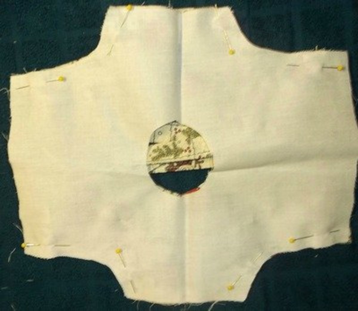 Sew the lining into the sides of the bodice, being careful when you sew the ties.