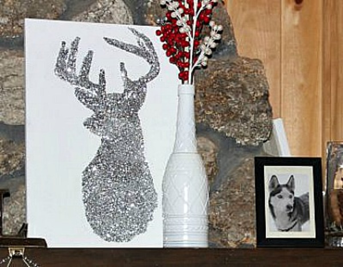 Sparkly reindeer silhouette on canvas