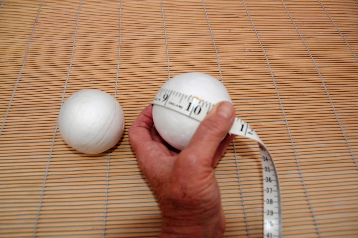 10" LACrafts Smooth Foam Balls. The circumference of the larger ball is 10 inches.