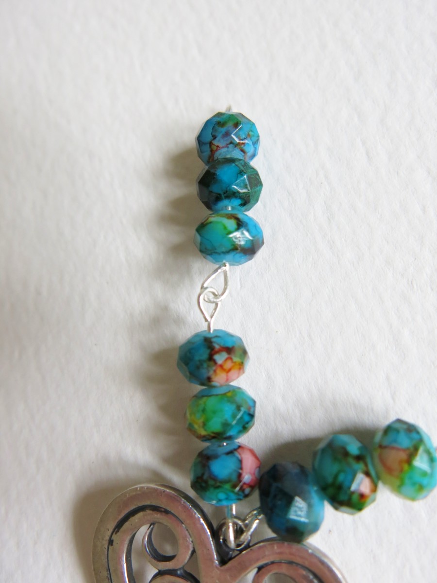 Repeat steps 1-4 to connect another beaded link to your pendant.