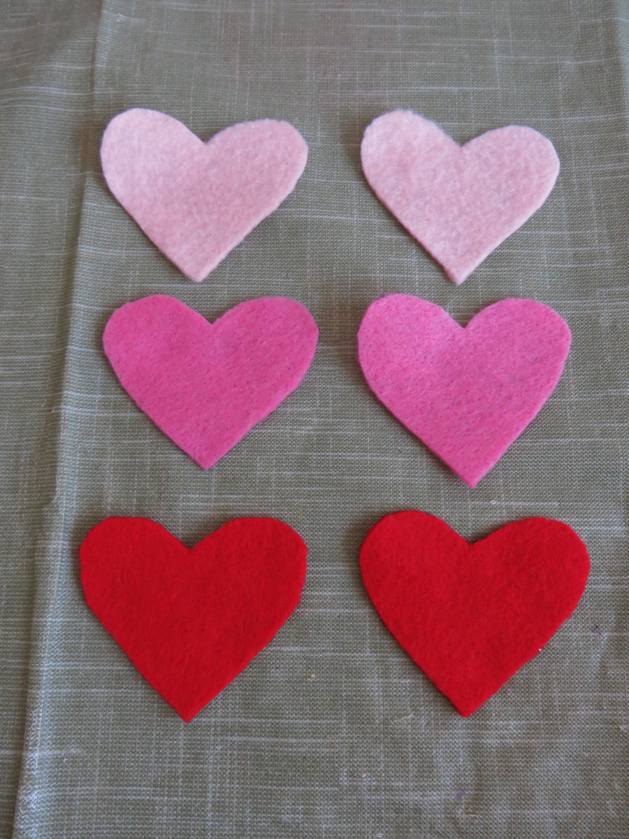 Cut out felt hearts using your template.