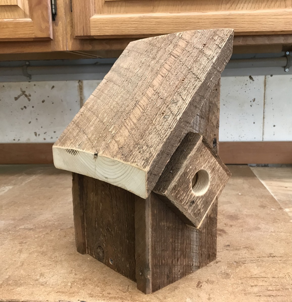 The finished birdhouse is ready for the garden