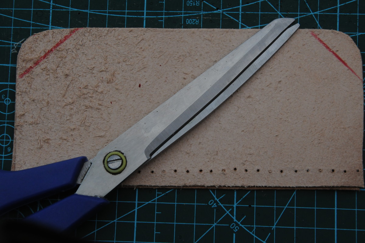 Trim the top edge once you have established how long the side should be.