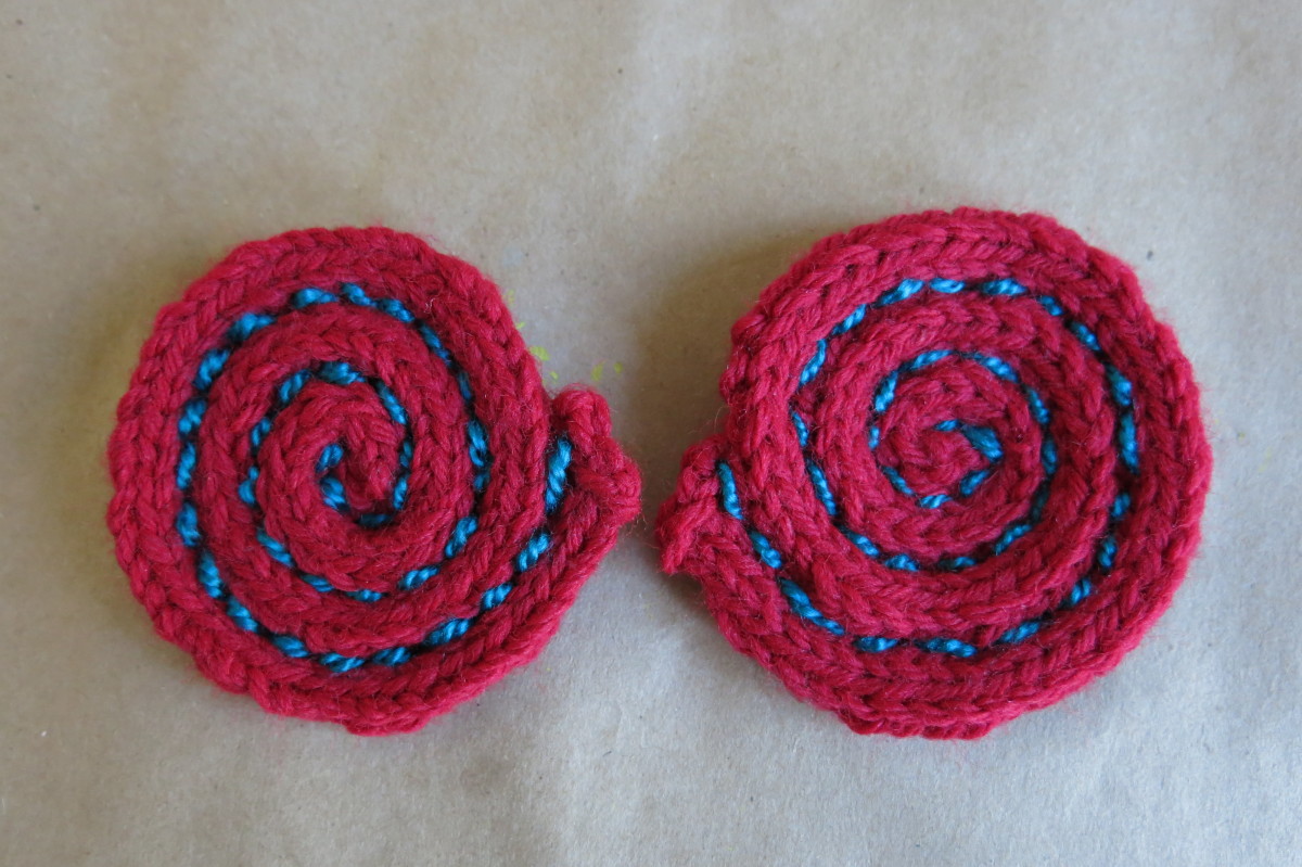 Make two i-cord spirals to create a yarn ball Christmas decoration.
