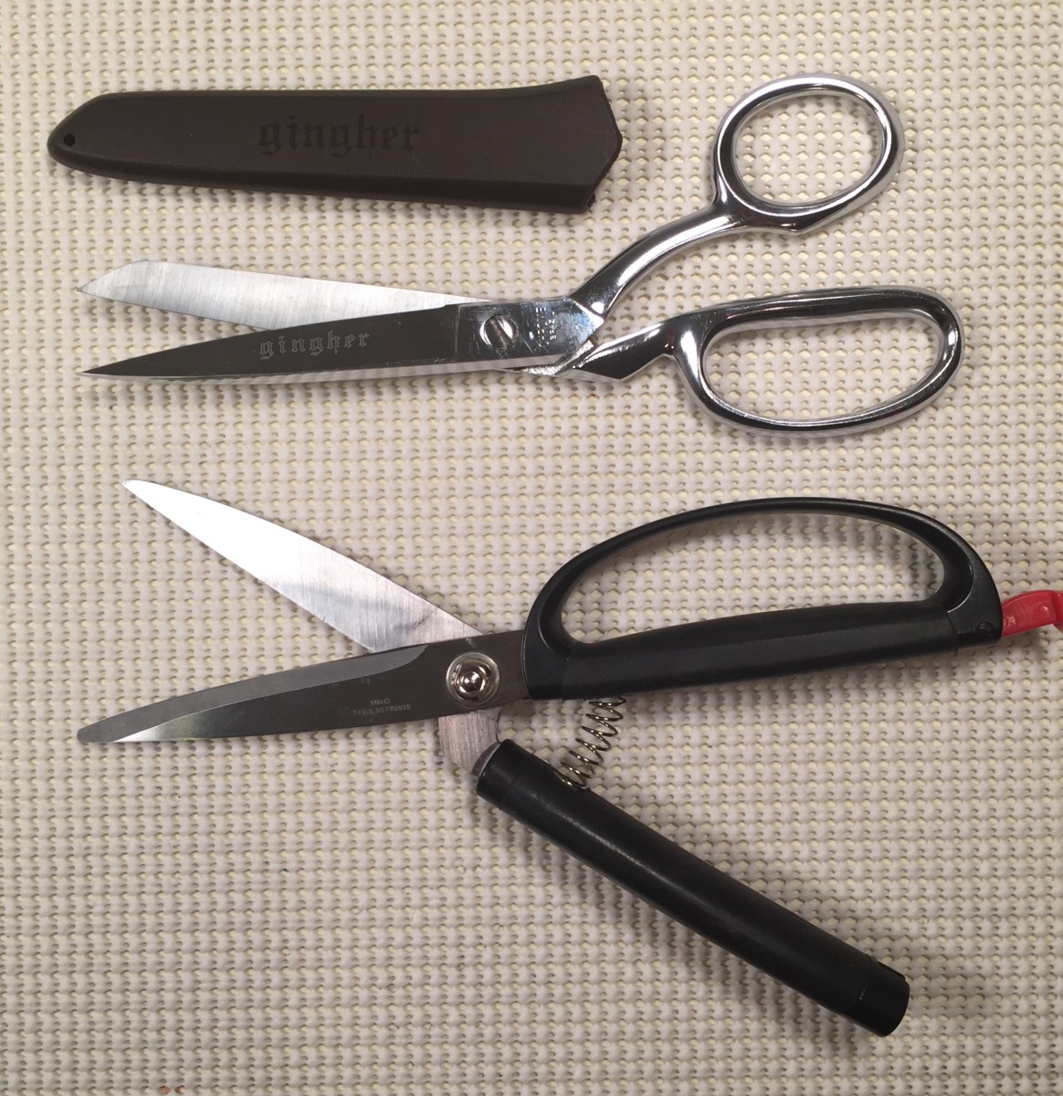 Fabric shears and spring-loaded scissors.
