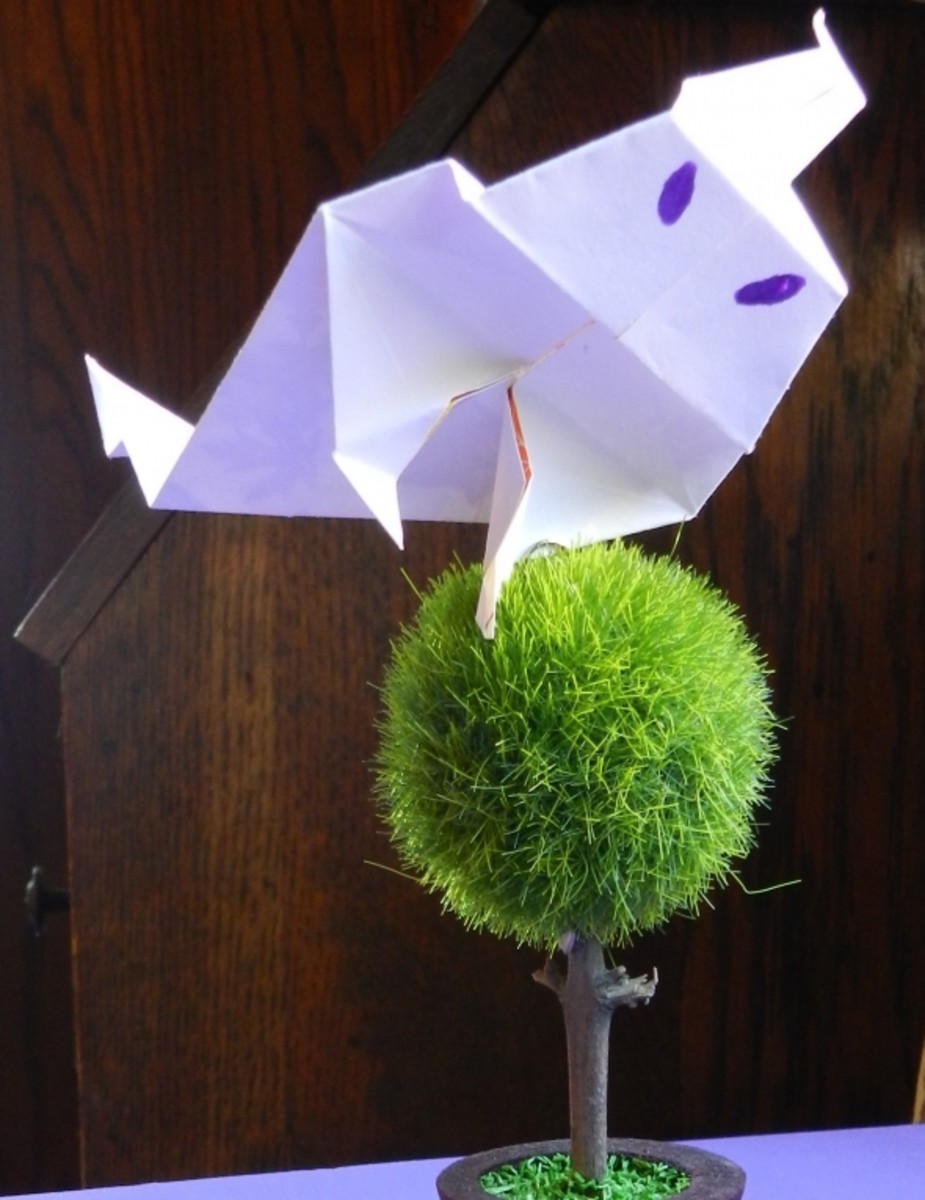 This is a finished origami ghost. These make great decorations for the Halloween or autumn party as place settings.