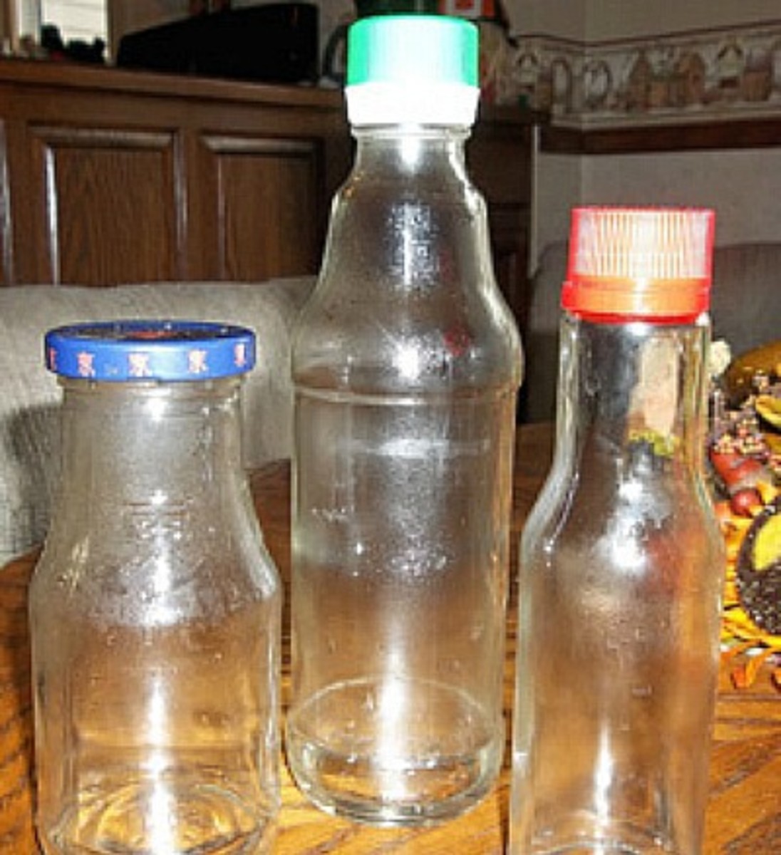 Three glass bottles of different sizes 