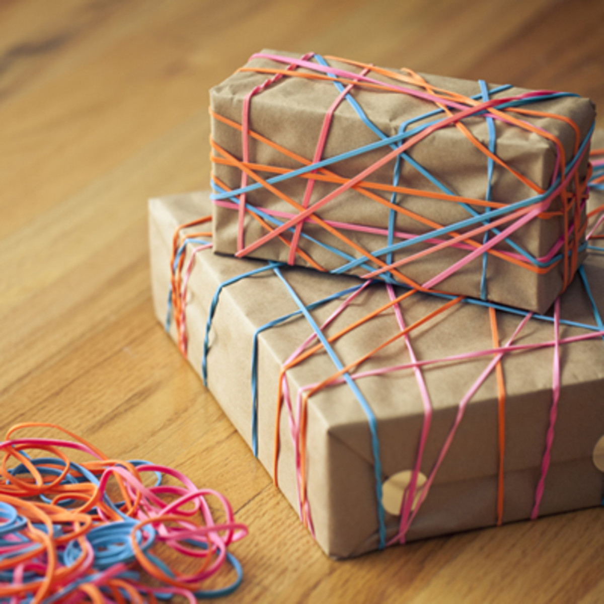 A rubber band tied gift is very creative wrapping prank. Wrapping your presents like this is sure to give a few giggles!
