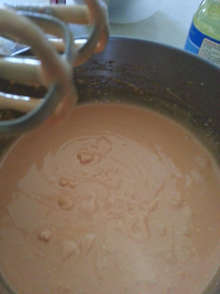 I tinted my batter orange to match the color I planned for the cake's exterior. 