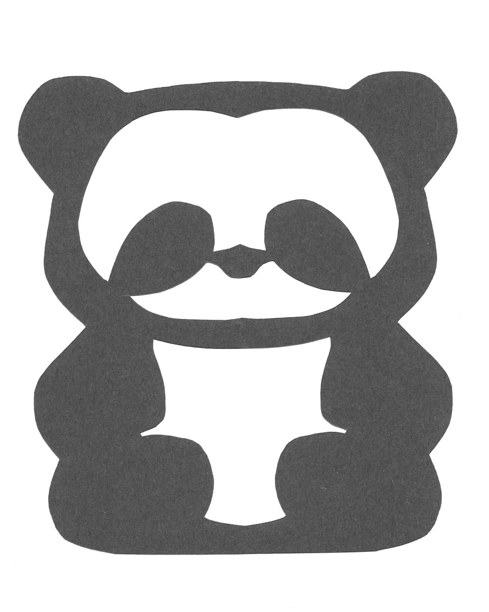 This site includes a printable template for this adorable papercut panda.
