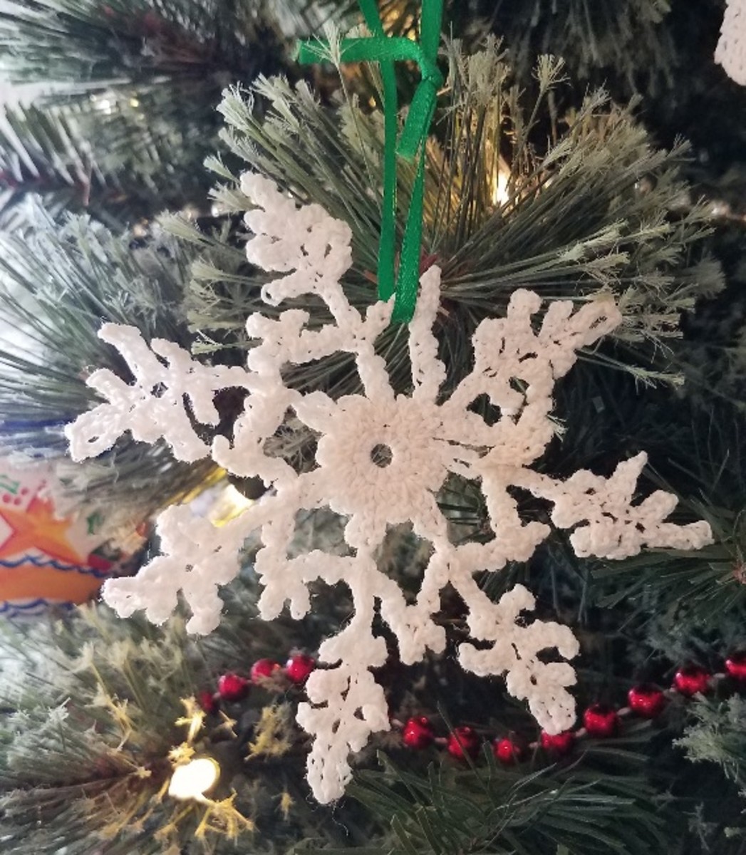 Doily snowflakes are a fun, messy craft.