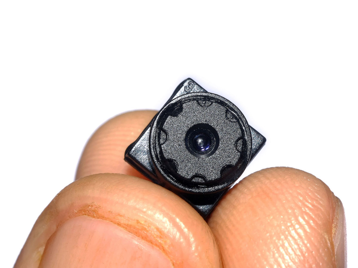 Miniature spy camera lenses are very hard to see.