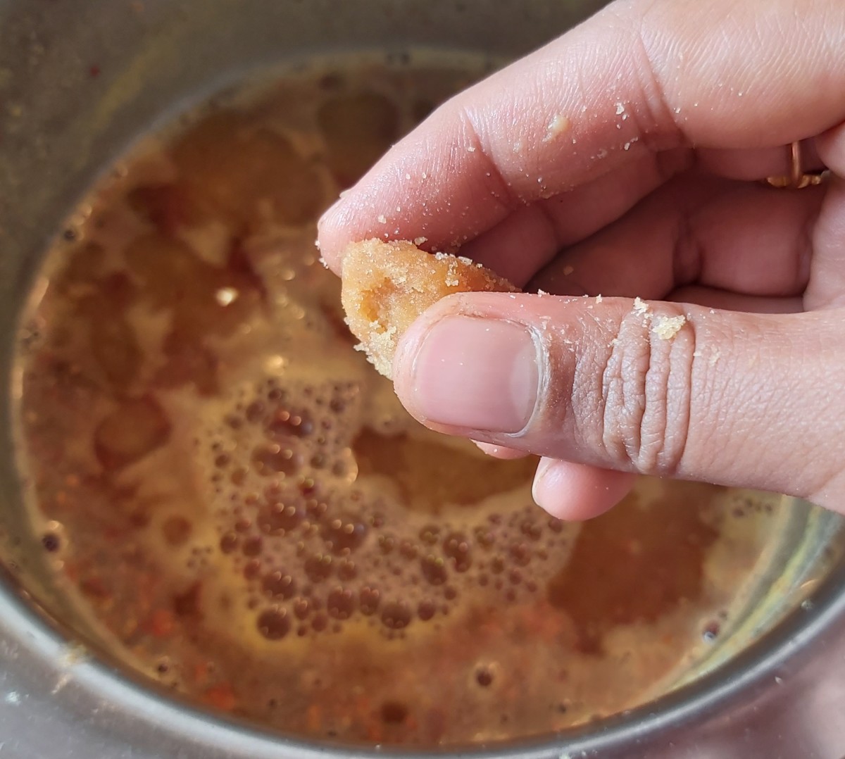 Add about 1 teaspoon of jaggery (or more to taste). The jaggery balances the sourness of the tamarind.