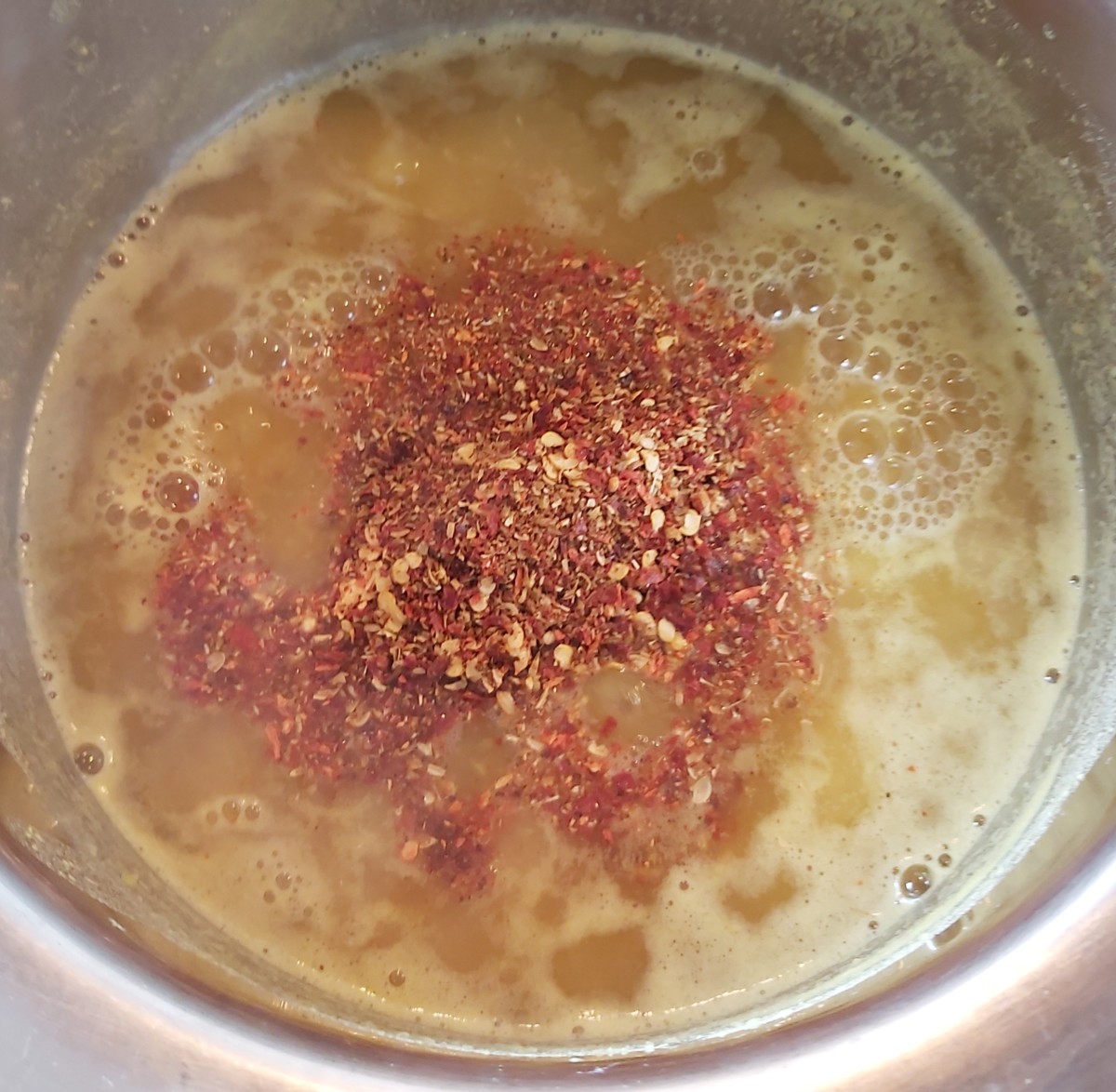 Add the prepared rasam powder (if you prepared a large quantity, just add about 2 to 3 teaspoons). Mix well.