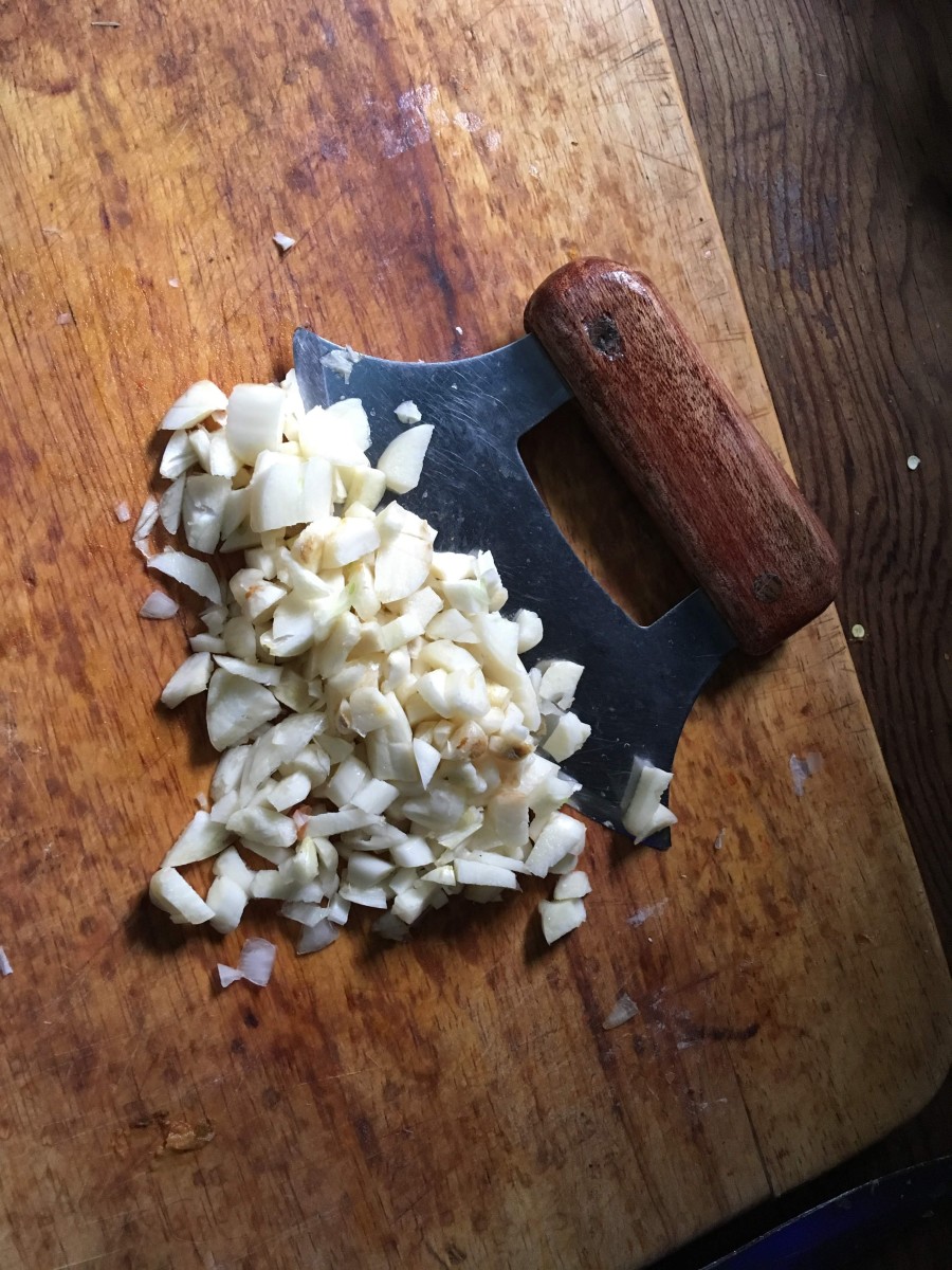 I use my ulu on a daily basis for chopping and mashing garlic. By loosening the skins with a blow with the flat of the blade, I can prep, crush, or mince a garlic head as fast as I can process it in a food processor.
