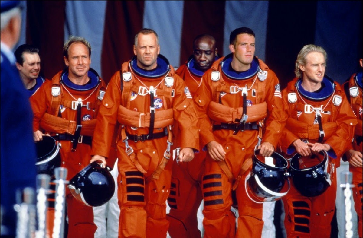 Willis (centre) leads an all-star cast against an effects-laden spectacular that sacrifices brains for thrills.