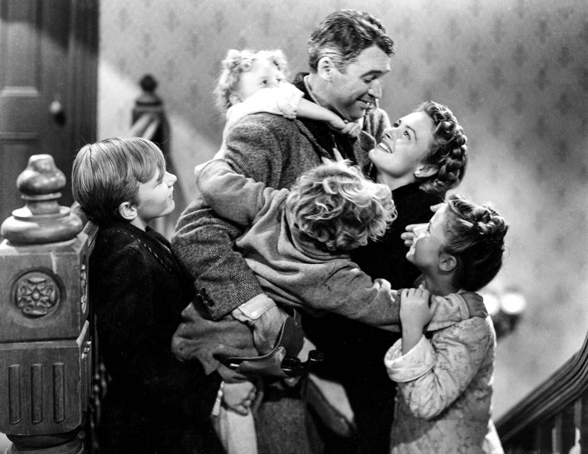The Bailey Family: (Clockwise from left to right: Larry Simms, Karolyn Grimes, James Stewart, Donna Reed, Carol Coombs-Mueller, and Jimmy Hawkins.