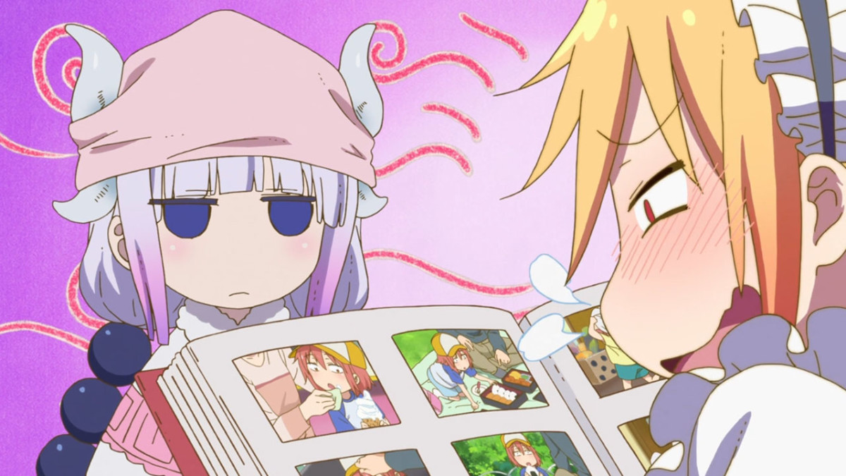 Tohru gushes over albums of a younger Kobayashi in front of an unamused Kanna.