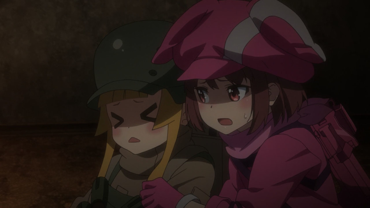 LLENN drags an injured and distraught Fuka from the danger zone.