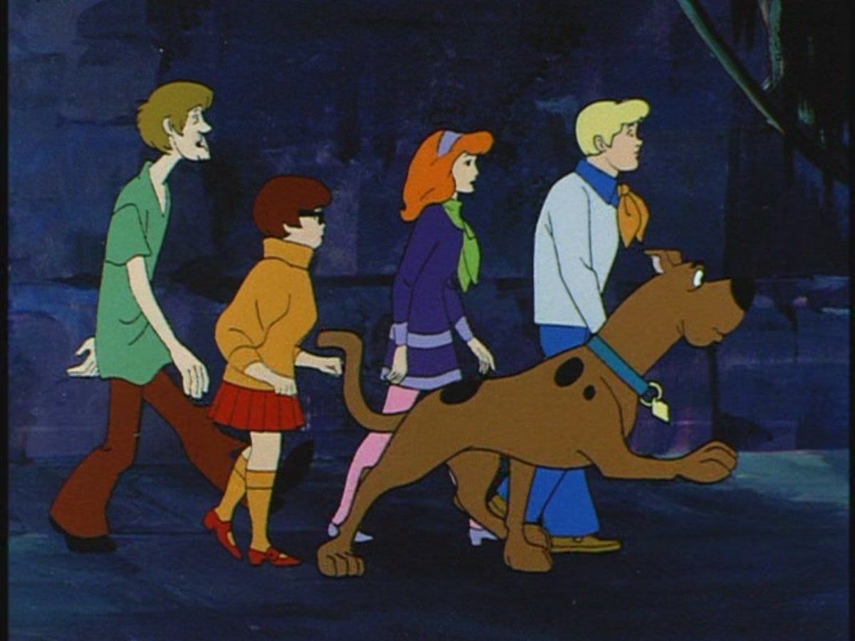 The Mystery, Inc. "gang" in action. Note: episodes were almost always set at night and often used murky backgrounds to set the mood.
