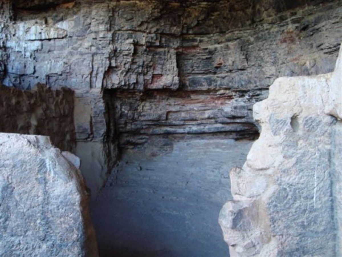 Black stains on the cave wall are evidence of cooking fires.