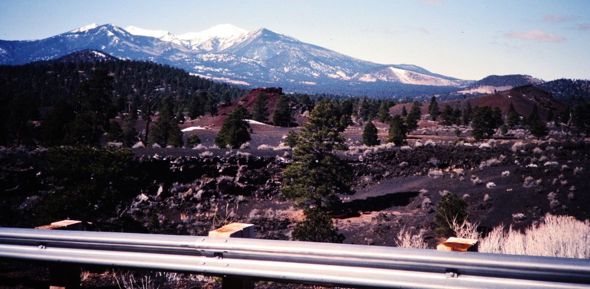 Colors from the Sunset Crater volcanic debris in the foreground with San Francisco peaks in the background.