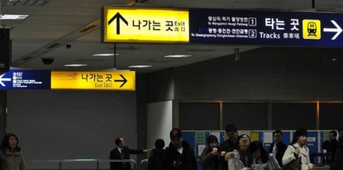 Signage in Korean and English at Seoul Metro Station