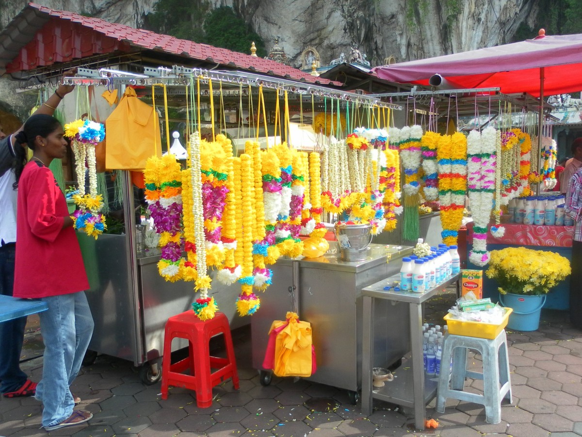 The Indian garland stall looks colourful and exotic.