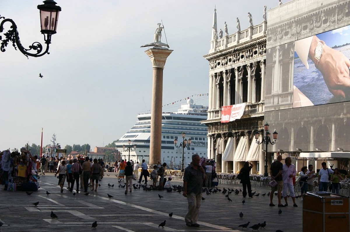 Tourist cruise liners dock in the center of Venice at St Mark's Square. Each ship offloads thousands of day-only visitors.