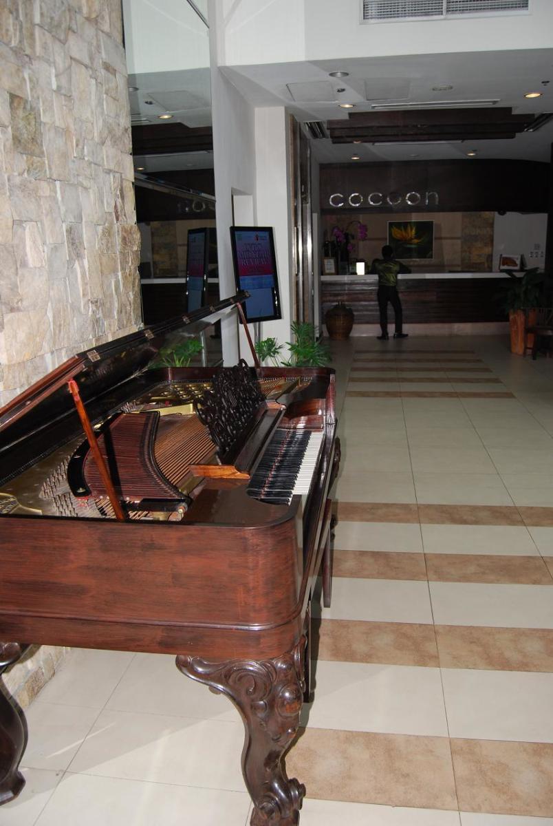 The Antique Piano in the Lobby