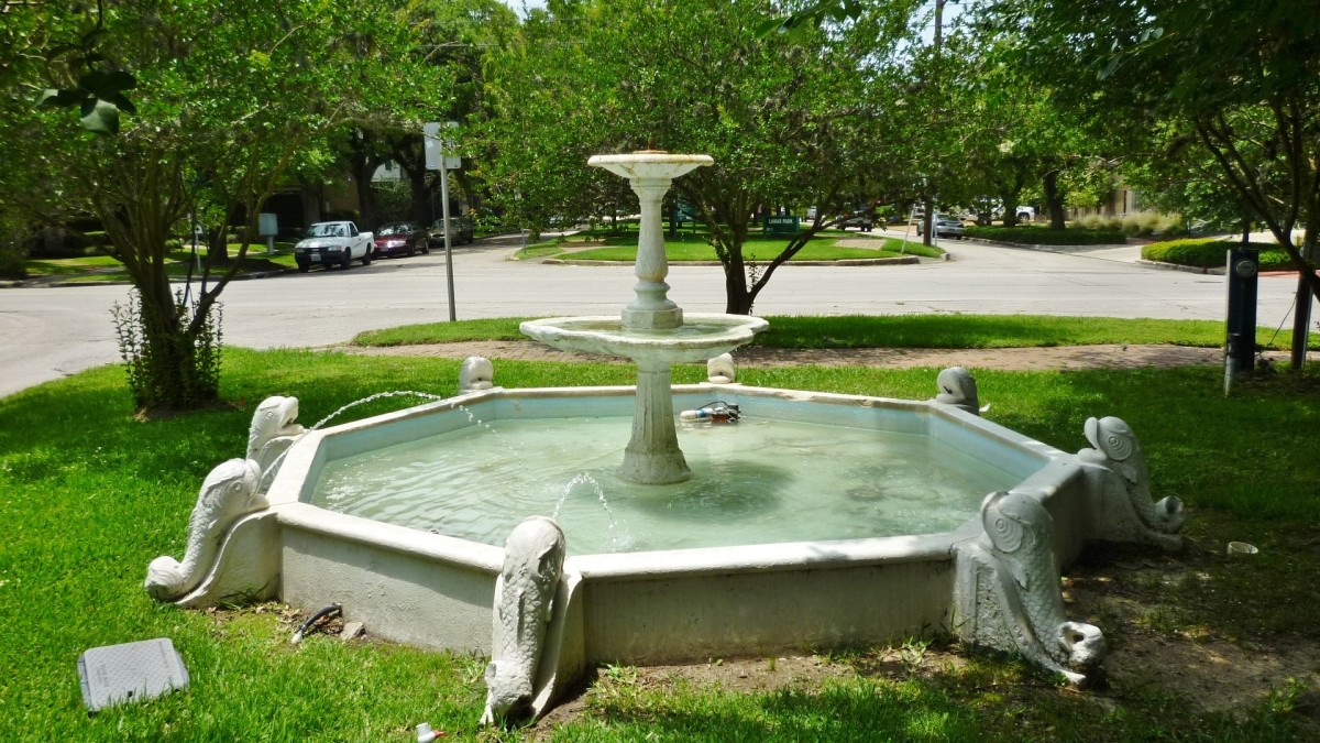Antique dolphin fountain in Lamar Park