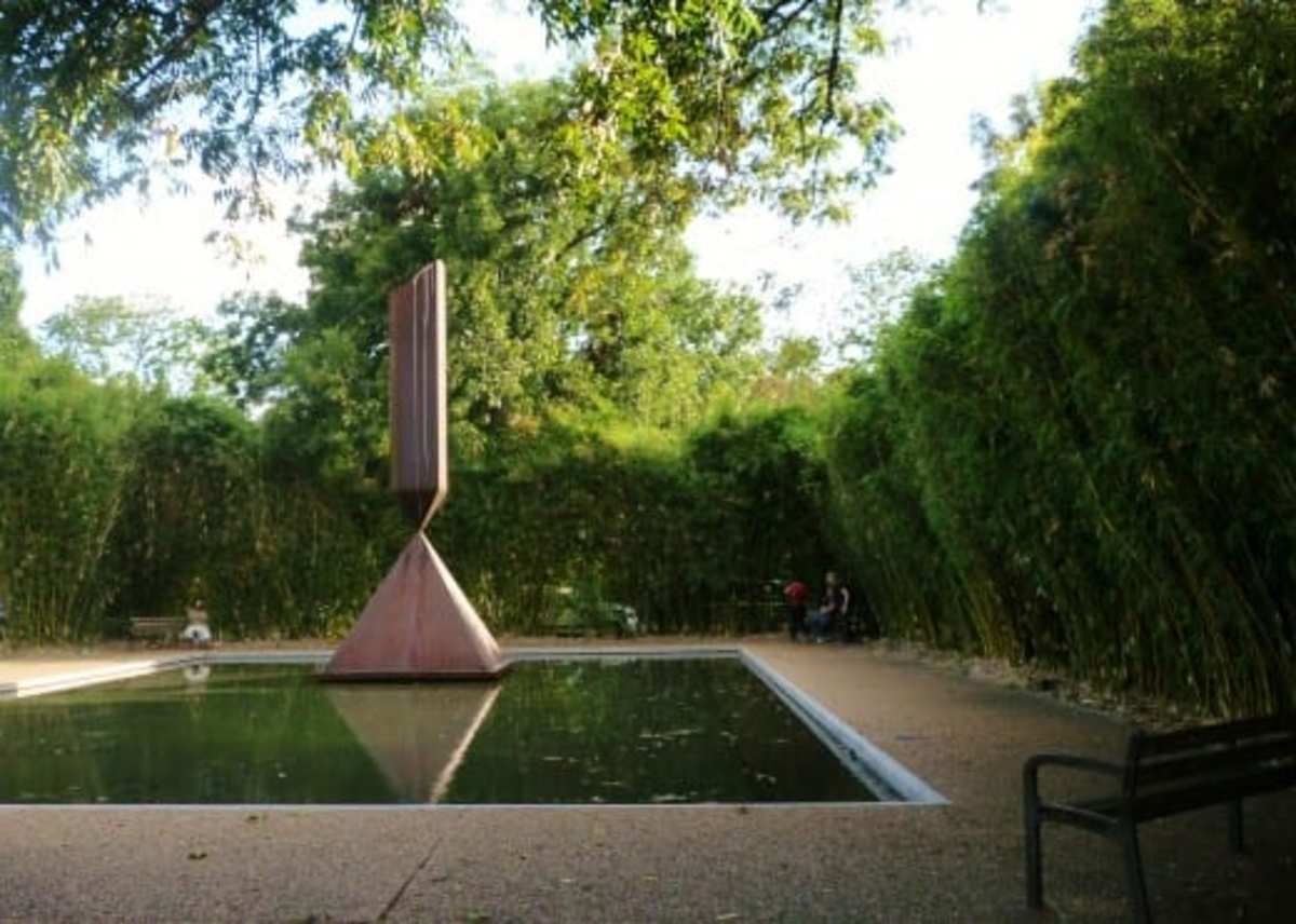 Bamboo surrounds two sides of the reflection pool & sculpture outside of the Rothko Chapel.