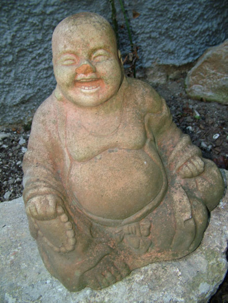 A joyful laughing Buddha can help in easing your troubles.