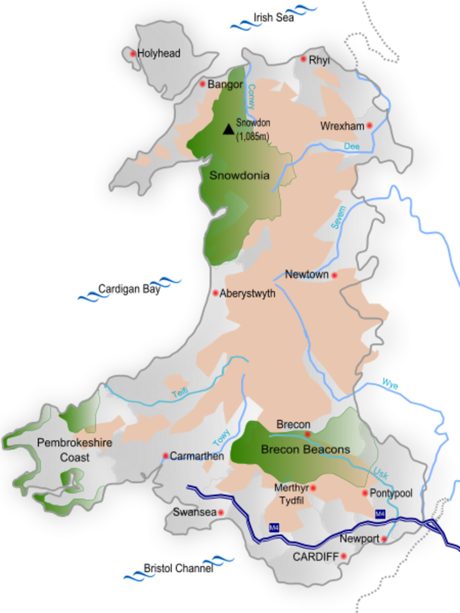 A map of Wales. Green areas are national parks and the pink areas are above 600 feet. Harry Secombe was born and grew up in Swansea in South Wales.