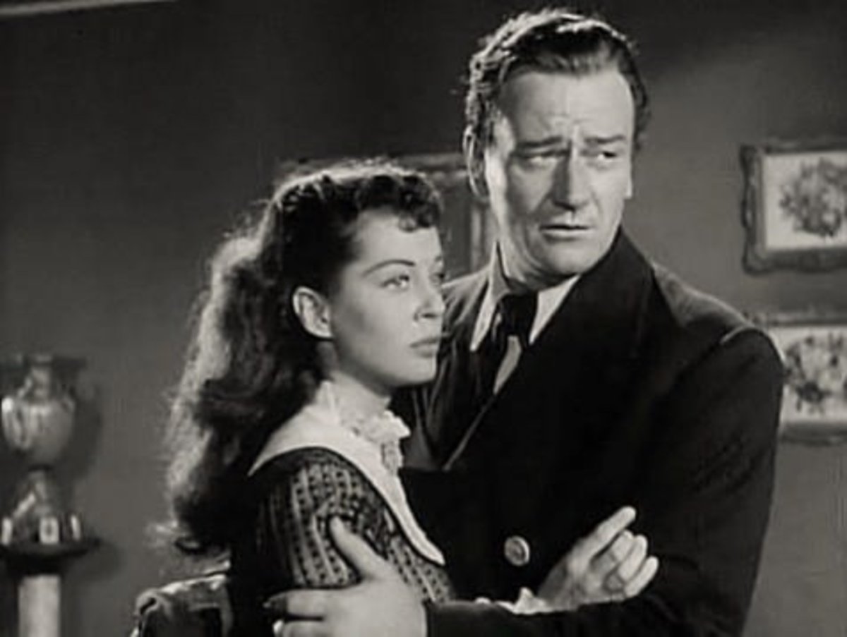 Gail Russell and John Wayne in "Wake of the Red Witch." 