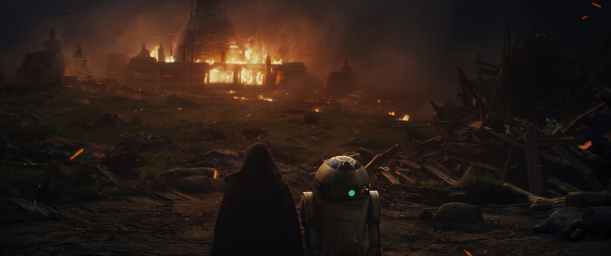 Kylo leaves the temple in ruins.