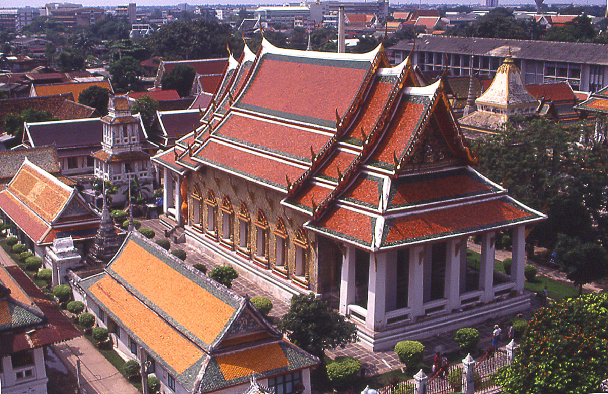Wat Arun, Temple of the Dawn, in Bangkok as seen from the tall Khmer-style "prang'"shown in the named photo above