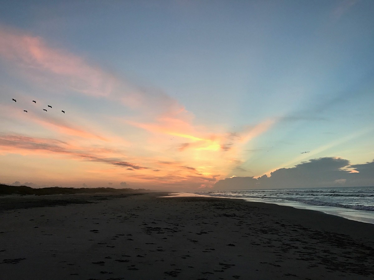 Few things can surpass a sunrise over the Atlantic Ocean in the Outer Banks of North Carolina.