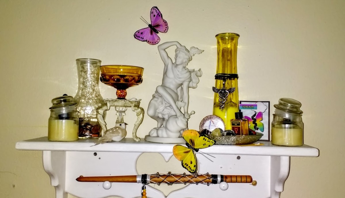 As a freelance writer, I felt compelled to keep a shrine to the God of communication and writing above my work desk on a small shelf. This image is of a simple, permanent shrine to Hermes.