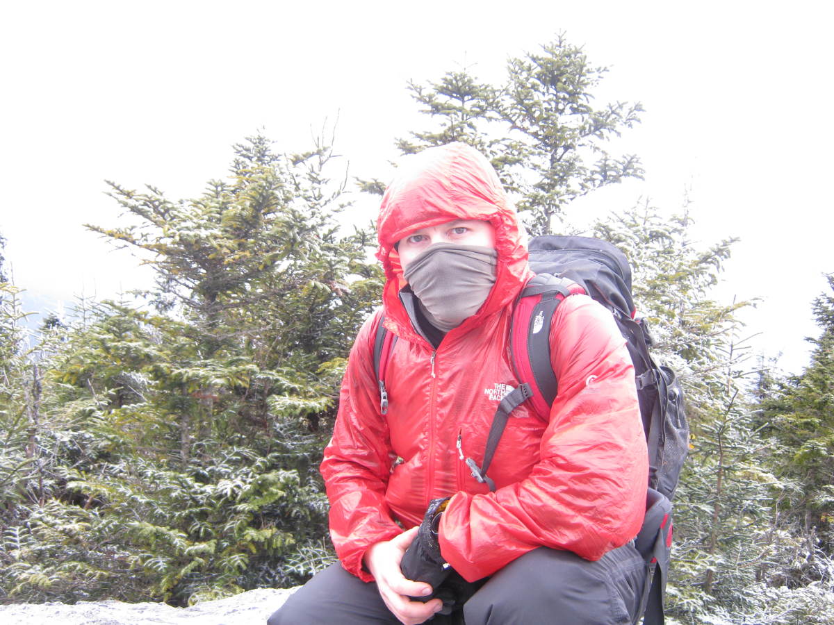 A good set of lightweight waterproof/windproof/breathable shells are paramount for hiking the High Peaks in all seasons.  Here I am on the summit of Porter.  