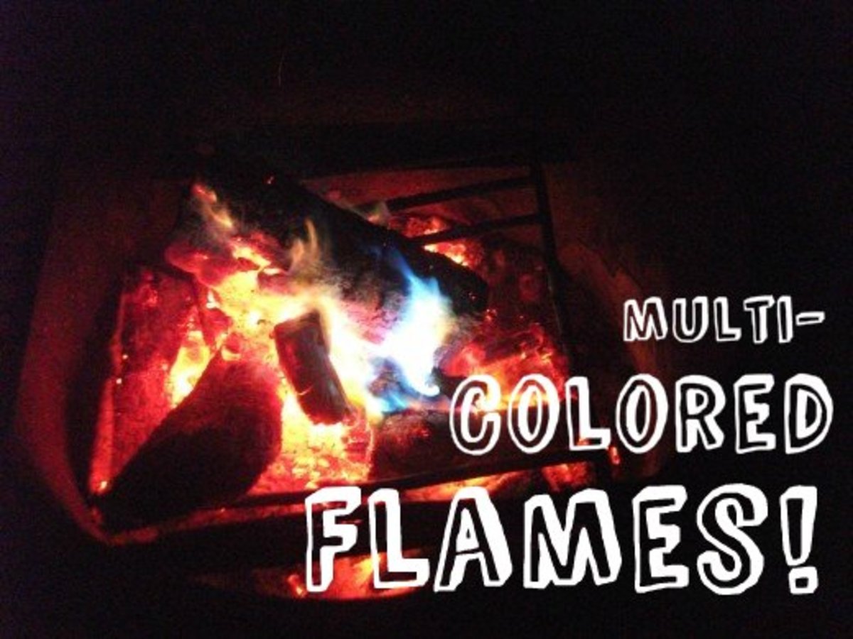 Shades of blues, greens, purples, yellows, and oranges can be seen in the flames. 