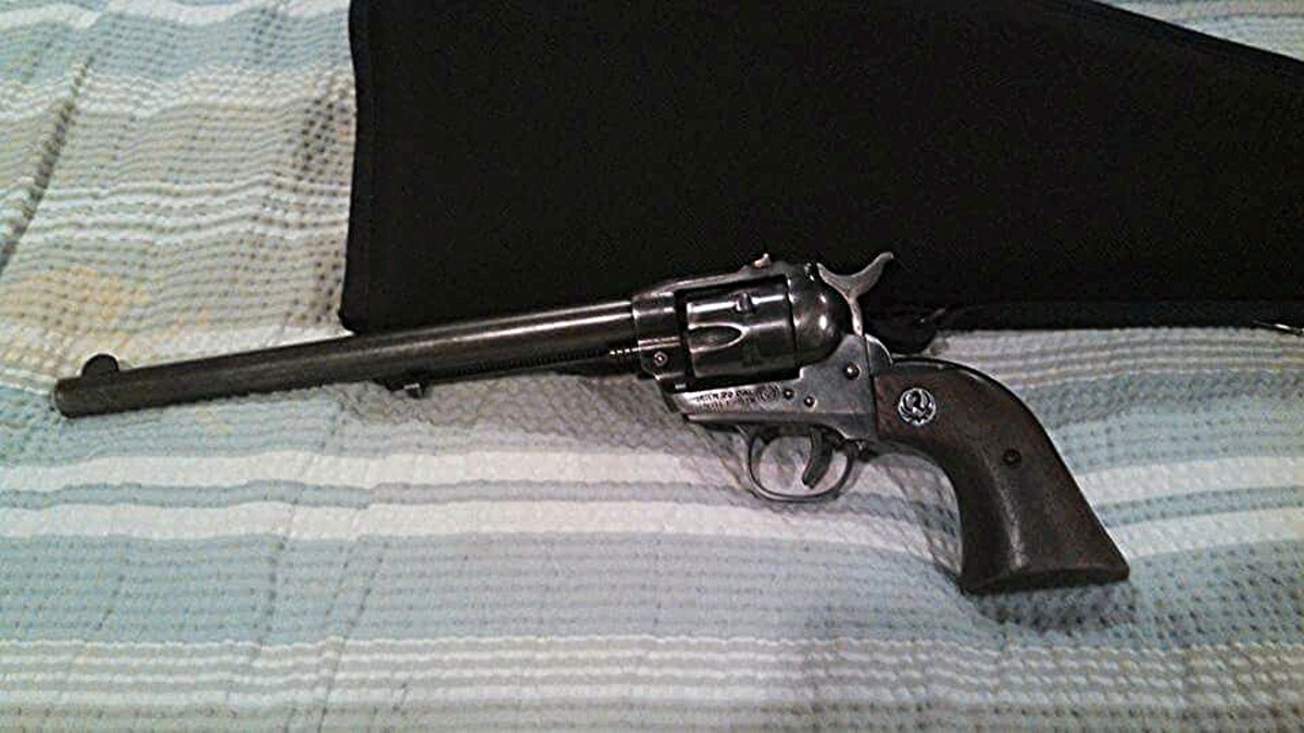 Old model Ruger Single six with 9.5" barrel.